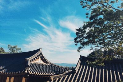 Low angle view of built structure against blue sky