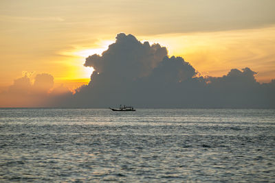 Domestic fishery boat in koh tao island southern of thailand against beautiful dusky sky