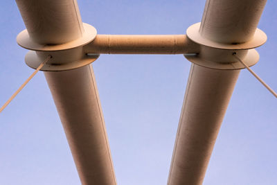 Low angle view of communications tower against sky