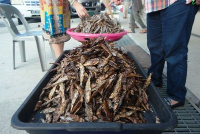 Close-up of salted fish for sale in market