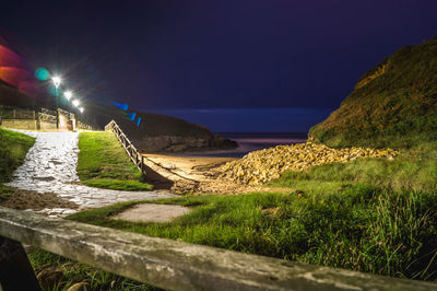 Scenic view of sea against sky at night