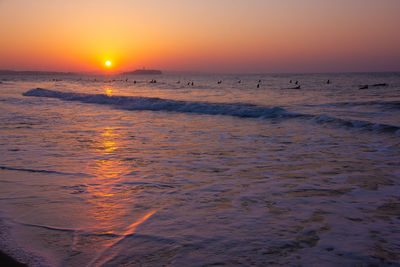 Scenic view of sea against sky during sunset