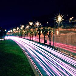 Light trails on road at night