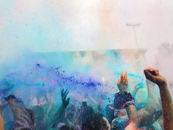 Group of people enjoying at holi