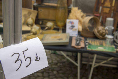 Close-up of label on display cabinet in store