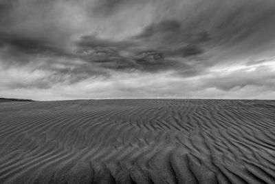 Scenic view of desert against sky