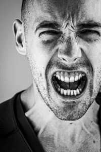 Close-up portrait of frustrated man