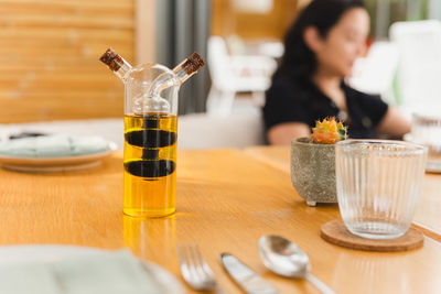 Olive oil and balsamic vinegar on dinner table.