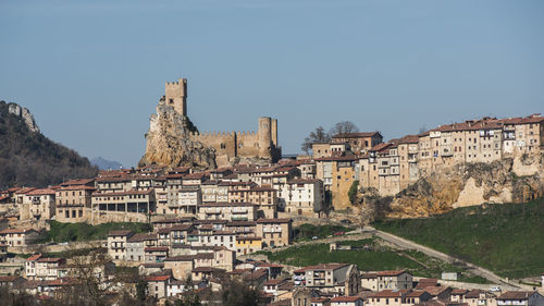 Townscape against clear sky