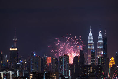 Illuminated city lit up at night