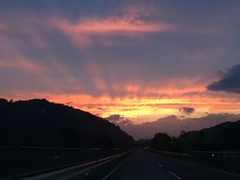 Road against sky during sunset