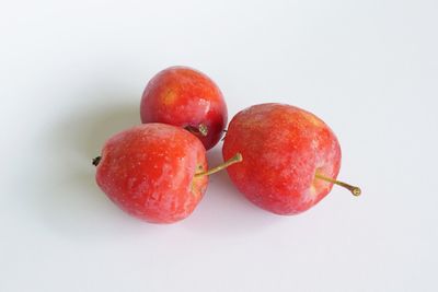 Close-up of apple against white background