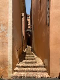 Narrow alley amidst buildings