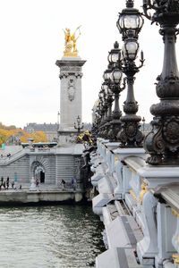 Statue of bridge over river