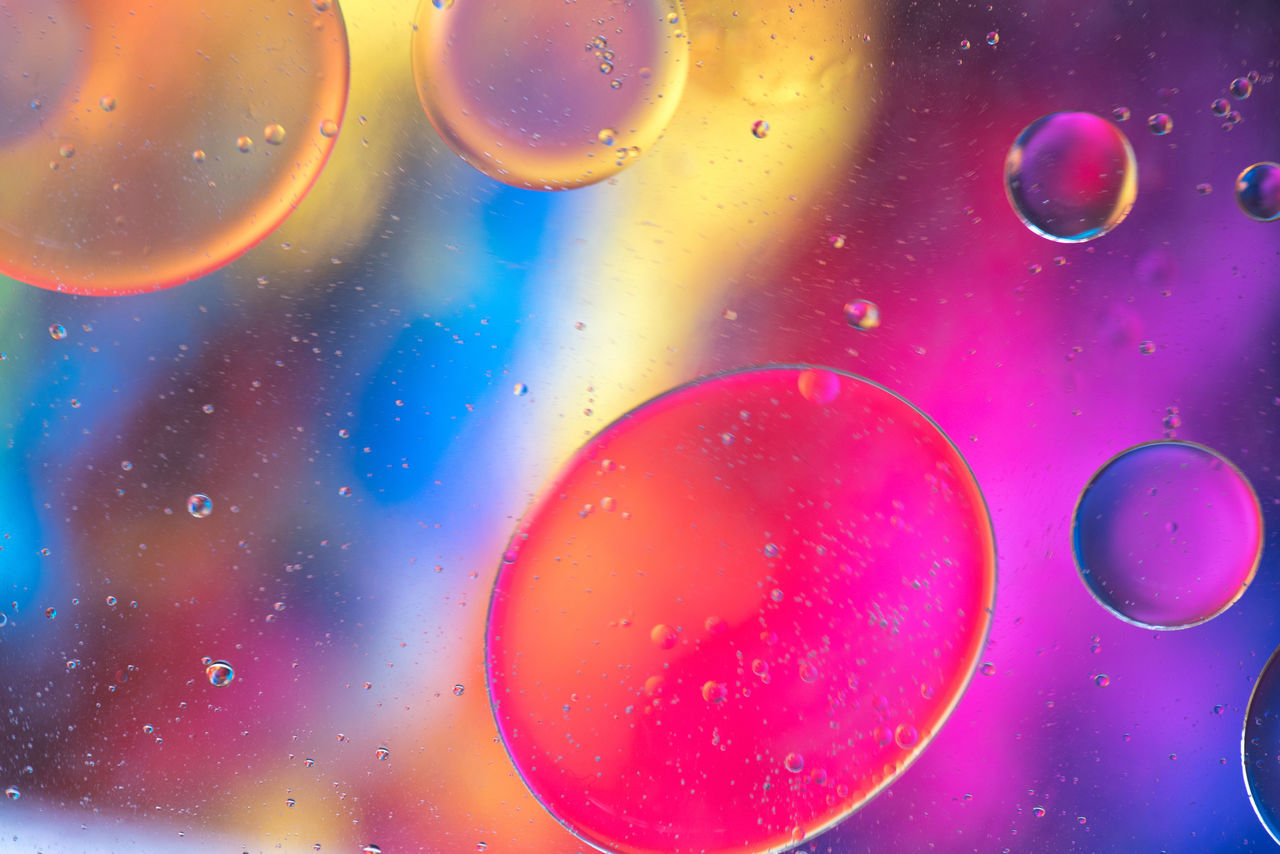 FULL FRAME SHOT OF BUBBLES WITH WATER