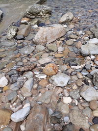 Close-up of pebbles on beach