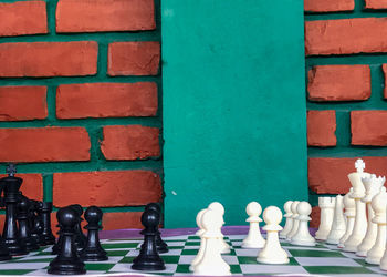 Full frame shot of chess pieces on wall