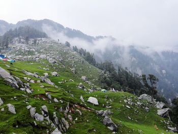 Landscape with mountain range in background