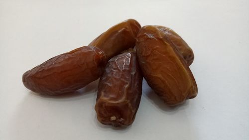 High angle view of chocolate against white background