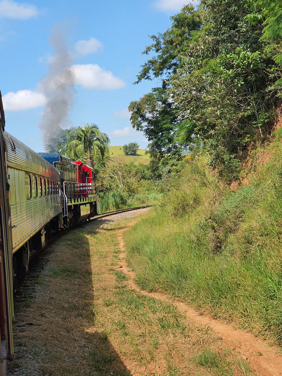 VIEW OF TRAIN PASSING THROUGH LAND