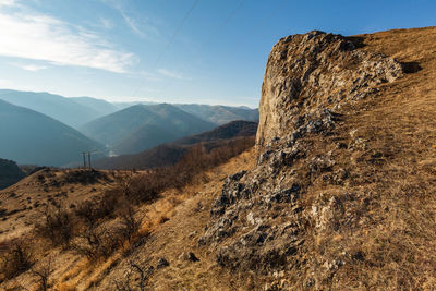 Scenic view of rocky mountains against sky