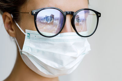 Close-up of woman wearing sunglasses