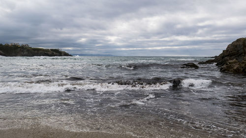 Scenic view of sea and cloudy sky