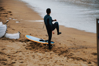 Rear view of man on beach