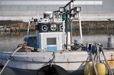 Close-up of boats in river