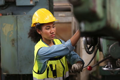 Portrait of engineer working in factory