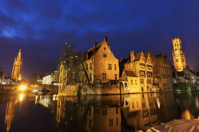 Low angle view of historic building against sky at night
