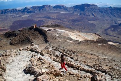 High angle view of woman walking at el teide national park