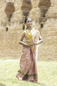 Woman standing on field