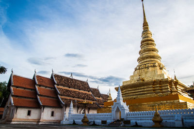 View of temple against building