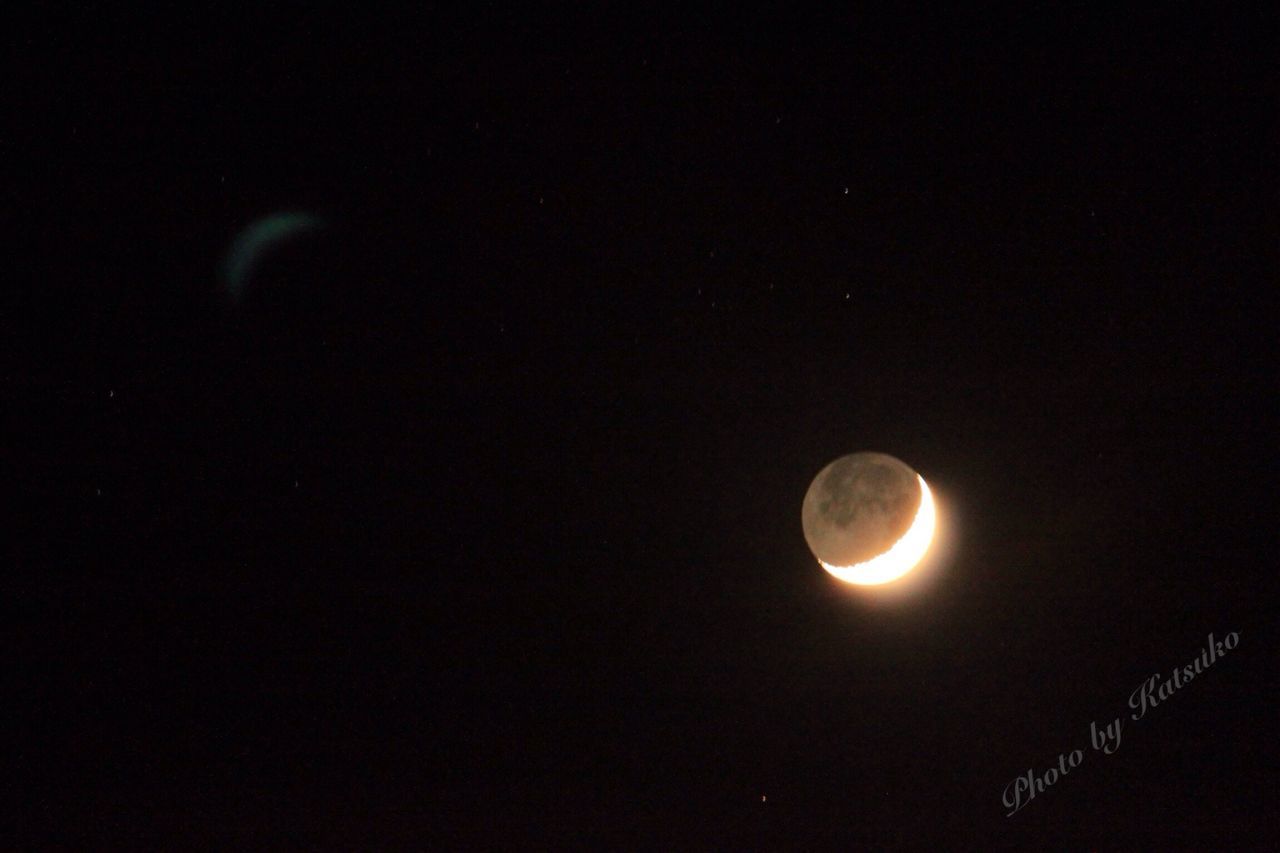 LOW ANGLE VIEW OF MOON IN SKY