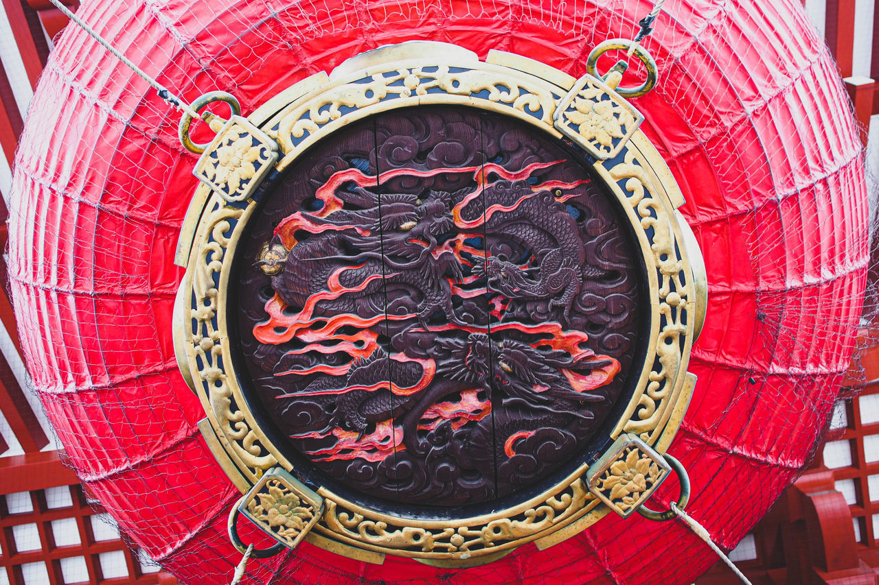 CLOSE-UP OF RED LANTERN ON BUILDING