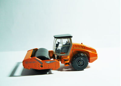 Toy car against white background