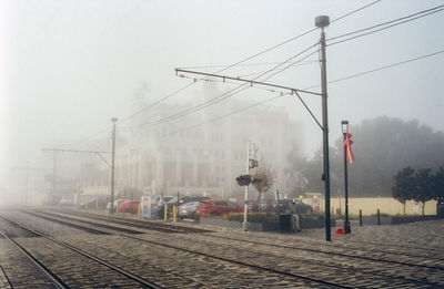 Railroad tracks against clear sky