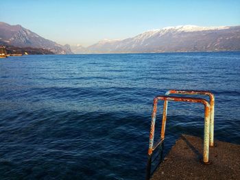 Scenic view of sea against mountains