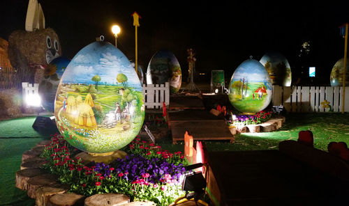 Close-up of illuminated lights at night