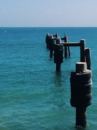 Scenic view of sea against blue sky