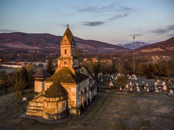 Historic building against sky at dusk