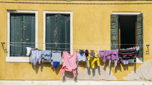 Clothes drying against building