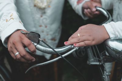 Close-up of man holding hands