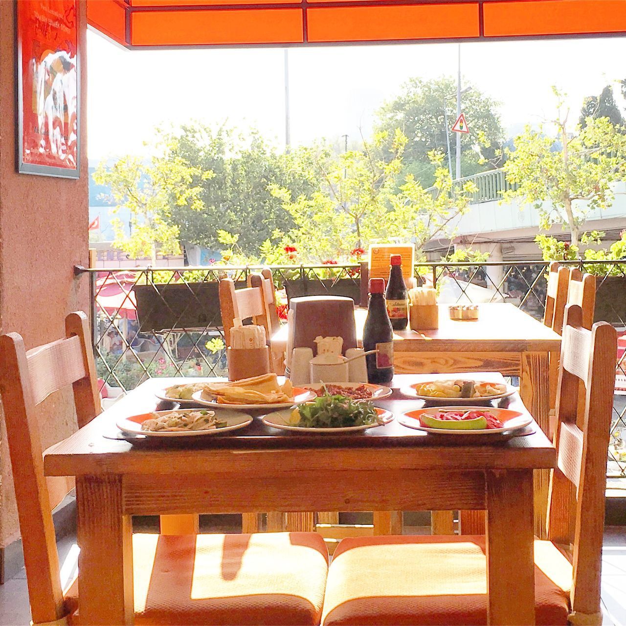 CHAIRS AND TABLES AT RESTAURANT