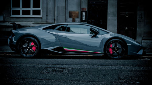 Car parked on street in city at night