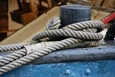 Close-up of rope tied on boat cleat
