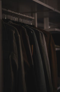 Close-up of clothes hanging on rack