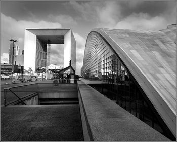 View of bridge and buildings against sky