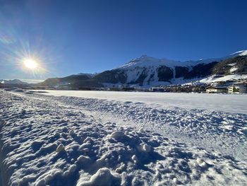 Scenic view of snowcapped mountains against sky